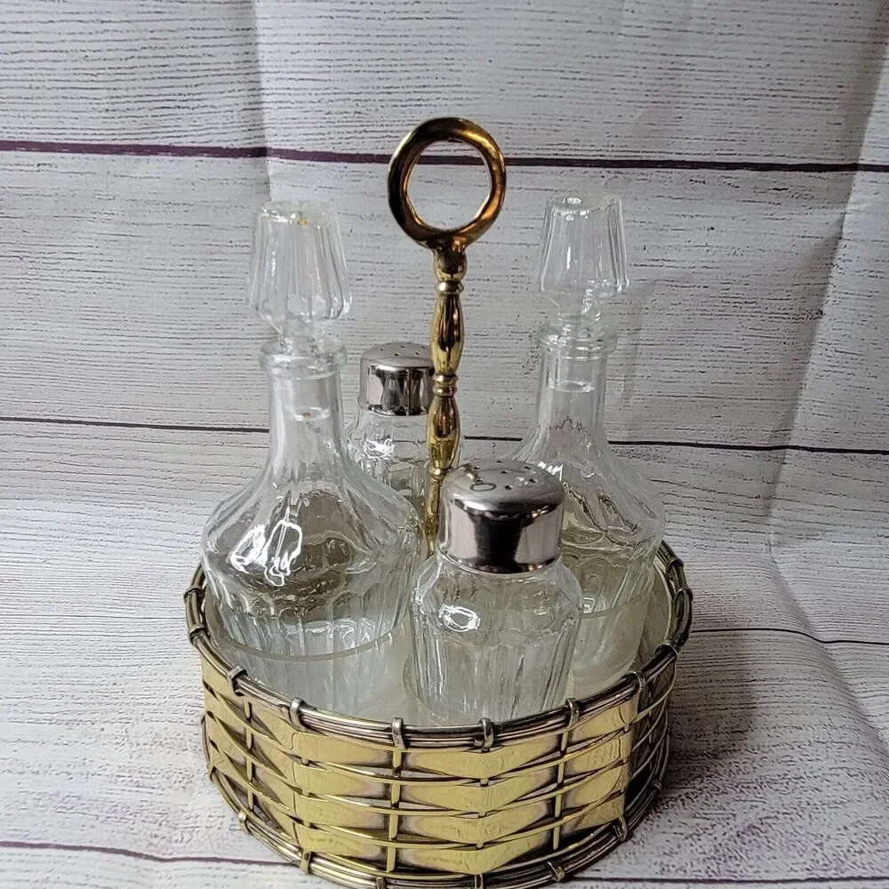 Vintage brass salt, pepper, vinegar, and oil jars with holder table-centerpiece